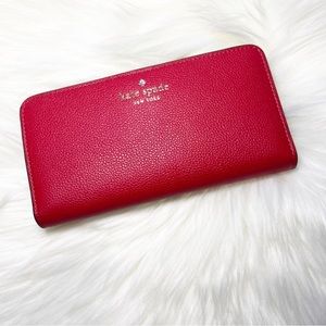 Kate Spade Bailey Pebbled Leather Large Slim
Bifold Wallet, Candied Cherry Red